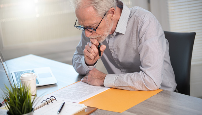 businessman checking a document